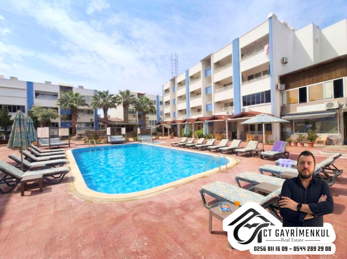 DİDİM'DE SATILIK 2+1 ORTA KAT DENİZE YAKIN HAVUZLU SİTEDE KISMİ EŞYALI DAİRE